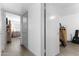 Bright hallway with doors to bedrooms and other areas of the home at 5835 E Dodge St, Mesa, AZ 85205