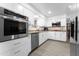 Modern kitchen with stainless steel appliances and granite countertops at 5835 E Dodge St, Mesa, AZ 85205