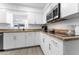 Modern kitchen with stainless steel appliances and granite countertops at 5835 E Dodge St, Mesa, AZ 85205