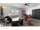 Bright living room featuring a comfy recliner and large window at 5835 E Dodge St, Mesa, AZ 85205