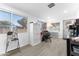 Bright and airy home office space with built-in shelving and window light at 5835 E Dodge St, Mesa, AZ 85205