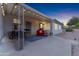 Covered patio with string lights, outdoor seating and a relaxing atmosphere at 5835 E Dodge St, Mesa, AZ 85205