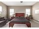 Bright bedroom with king-size bed and two nightstands at 9814 W Rowel Rd, Peoria, AZ 85383