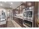 Modern kitchen boasts stainless steel appliances and granite countertops at 9814 W Rowel Rd, Peoria, AZ 85383