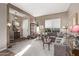 Spacious living room with large sectional sofa and entryway view at 9814 W Rowel Rd, Peoria, AZ 85383