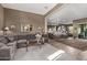 Open living room with a view into the kitchen and dining area at 9814 W Rowel Rd, Peoria, AZ 85383