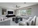 Spacious living room featuring a neutral color palette and ample natural light at 12145 W Briles Rd, Peoria, AZ 85383