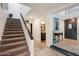 Modern staircase with carpet runner and entryway view at 13167 N 104Th St, Scottsdale, AZ 85260