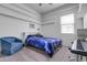 Bedroom with a queen bed, window, and built-in shelves at 4219 N 161St Ave, Goodyear, AZ 85395