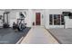 Home gym with elliptical machine and storage at 4219 N 161St Ave, Goodyear, AZ 85395