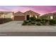 Single-story home with landscaped front yard and two-car garage at 4435 N Presidio Dr, Florence, AZ 85132