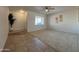 Bright living room featuring tile entry and carpet, perfect for comfortable living and easy maintenance at 4643 W Laurel Ln, Glendale, AZ 85304