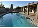 Inviting backyard pool and covered patio, perfect for outdoor relaxation and entertaining at 4643 W Laurel Ln, Glendale, AZ 85304