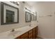 Bathroom with double sinks, vanity, and shower at 5081 W Fairview St, Chandler, AZ 85226