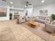 Bright living room featuring comfortable seating and tile floors at 521 E Cheyenne Rd, San Tan Valley, AZ 85143