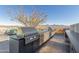 Outdoor kitchen and grill area with mountain views at 7120 E Kierland Blvd # 307, Scottsdale, AZ 85254