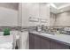 Elegant bathroom with dark vanity, tile, and modern fixtures at 7120 E Kierland Blvd # 307, Scottsdale, AZ 85254