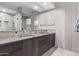 Elegant bathroom with double vanity and herringbone tile at 7120 E Kierland Blvd # 307, Scottsdale, AZ 85254