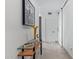 Contemporary entryway with glass-top console table at 7120 E Kierland Blvd # 307, Scottsdale, AZ 85254