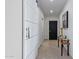 Bright entryway with modern barn door and console table at 7120 E Kierland Blvd # 307, Scottsdale, AZ 85254