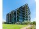 Modern high-rise building with green lawn at 7120 E Kierland Blvd # 307, Scottsdale, AZ 85254