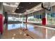 Modern indoor basketball court with hardwood floors and large windows at 7120 E Kierland Blvd # 307, Scottsdale, AZ 85254