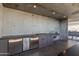 Outdoor kitchen with grill and refrigerator at 7120 E Kierland Blvd # 307, Scottsdale, AZ 85254