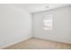 Simple bedroom with carpeted floor and window at 7370 W Whitehorn Trl, Peoria, AZ 85383