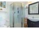 Small bathroom with shower stall, sink, and toilet at 9405 E Cherrywood Dr, Sun Lakes, AZ 85248