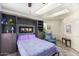 Charming bedroom with built-in murphy bed and shelving at 9405 E Cherrywood Dr, Sun Lakes, AZ 85248