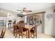 Bright dining area with table and chairs, kitchen and Gathering room views at 9405 E Cherrywood Dr, Sun Lakes, AZ 85248