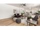 Spacious living area with an open concept, sleek flooring, and modern decor throughout at 135 E Julian Dr, Gilbert, AZ 85295