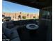 Cozy backyard patio with a seating area, fire pit, and string lights at 2738 E Cherry Hill E Dr, Gilbert, AZ 85298