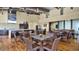 Community clubhouse boasting dining tables, chairs, kitchen, and lounge area at 2738 E Cherry Hill E Dr, Gilbert, AZ 85298