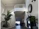 Bright entryway with open staircase, high ceilings, and fireplace at 2738 E Cherry Hill E Dr, Gilbert, AZ 85298