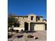Charming two-story home with stucco exterior, tile roof, and a two-car garage at 2738 E Cherry Hill E Dr, Gilbert, AZ 85298