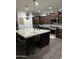 Modern kitchen featuring granite countertops and an island at 2738 E Cherry Hill E Dr, Gilbert, AZ 85298