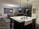 Kitchen with farmhouse sink and large island at 2738 E Cherry Hill E Dr, Gilbert, AZ 85298