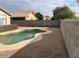 Inviting kidney-shaped pool in a sunny backyard at 4051 W Buckskin Trl, Phoenix, AZ 85083