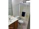 Cozy bathroom showcasing a vanity and a glass-enclosed shower-tub combination at 4051 W Buckskin Trl, Phoenix, AZ 85083