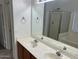 Double vanity bathroom with large mirror at 4051 W Buckskin Trl, Phoenix, AZ 85083