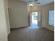Bright living room with carpeted floors and neutral walls at 4051 W Buckskin Trl, Phoenix, AZ 85083