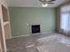 Living room with fireplace and tile floors at 4051 W Buckskin Trl, Phoenix, AZ 85083