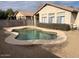 Kidney shaped pool in the backyard at 4051 W Buckskin Trl, Phoenix, AZ 85083