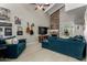 Spacious living room with stone fireplace and large sectional sofa at 4238 N 44Th St, Phoenix, AZ 85018