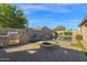 Beautiful backyard with a pool, fire pit, and outdoor kitchen area at 957 E Cedar Dr, Chandler, AZ 85249