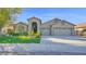 Charming single-story home featuring a spacious three-car garage and landscaped front yard at 957 E Cedar Dr, Chandler, AZ 85249