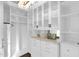 Walk-in closet offering custom shelving and storage for optimal organization and convenience at 957 E Cedar Dr, Chandler, AZ 85249