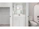 Small bathroom with toilet, vanity, and a bathtub at 14271 W Alameda Rd, Surprise, AZ 85387