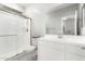 Clean bathroom with a walk-in shower, toilet, and modern vanity at 14271 W Alameda Rd, Surprise, AZ 85387